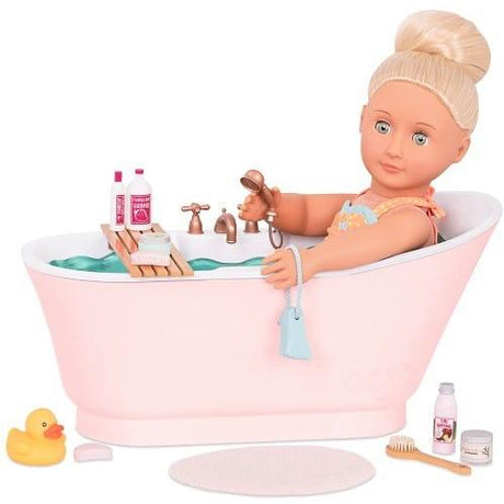 Wanienka dla lalki Our Generation Bath Bubbles Set z prysznicem, kosmetykami i dywanikiem, pobudza kreatywność dziecka.