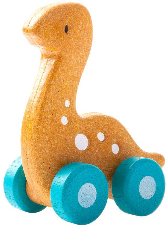 Plan Toys: dinozaur na kółkach Dino Car - Noski Noski