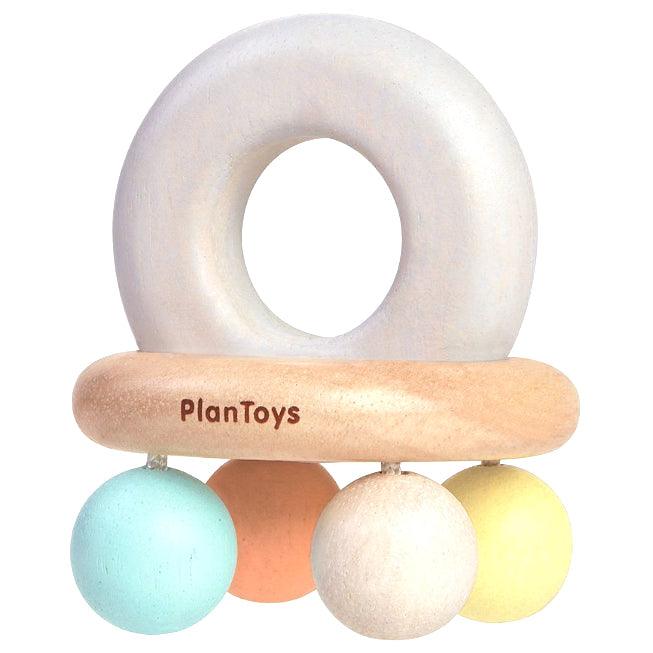 Plan Toys: pastelowa grzechotka Rattle Bell - Noski Noski