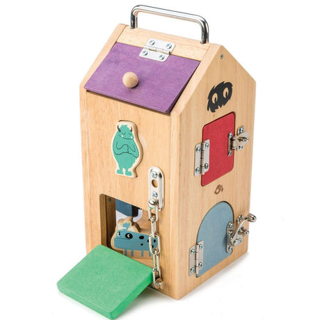Drewniana zabawka edukacyjna Tender Leaf Toys Monster Lock Box z zamkami i potworkami, domek manipulacyjny dla dzieci.