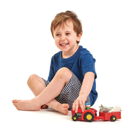 Tender Leaf Toys: drewniany traktor z przyczepą ze zwierzątkami - Noski Noski