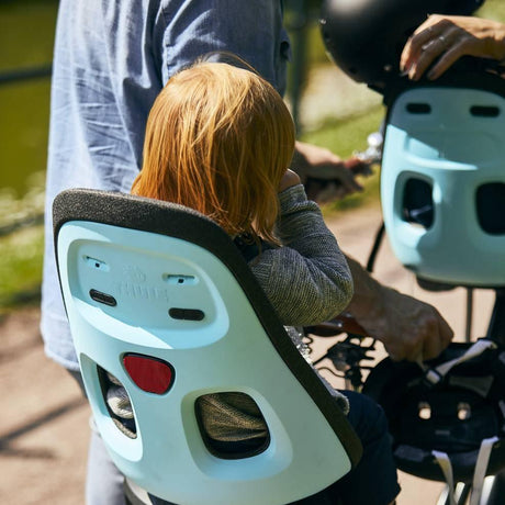 Fotelik rowerowy Thule Yepp Nexxt Maxi, lekki, amortyzujący, z pięciopunktowymi pasami, idealny dla aktywnych rodziców i dzieci.