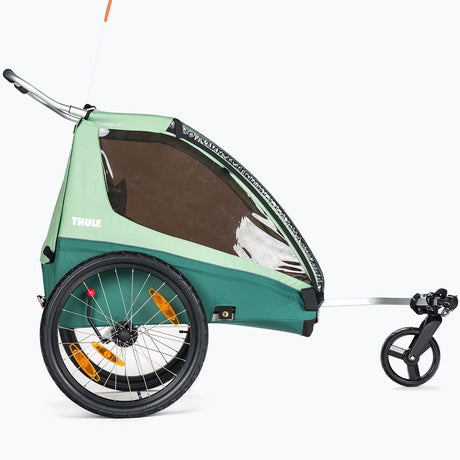 Wózek spacerowy Thule Coaster XT – lekki, składany, przekształcalny w przyczepkę rowerową, z pięciopunktowymi pasami.