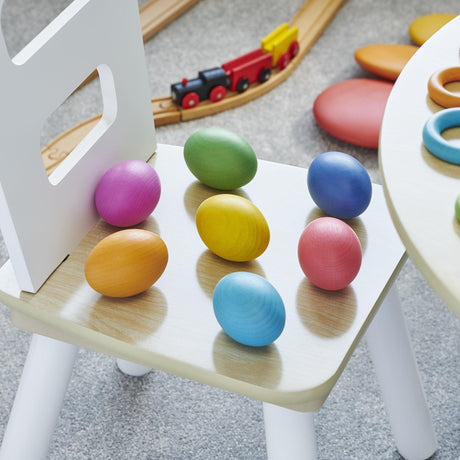 Jajka drewniane Tickit Rainbow, 7 kolorowych elementów do nauki liczenia, sortowania i kreatywnej zabawy.