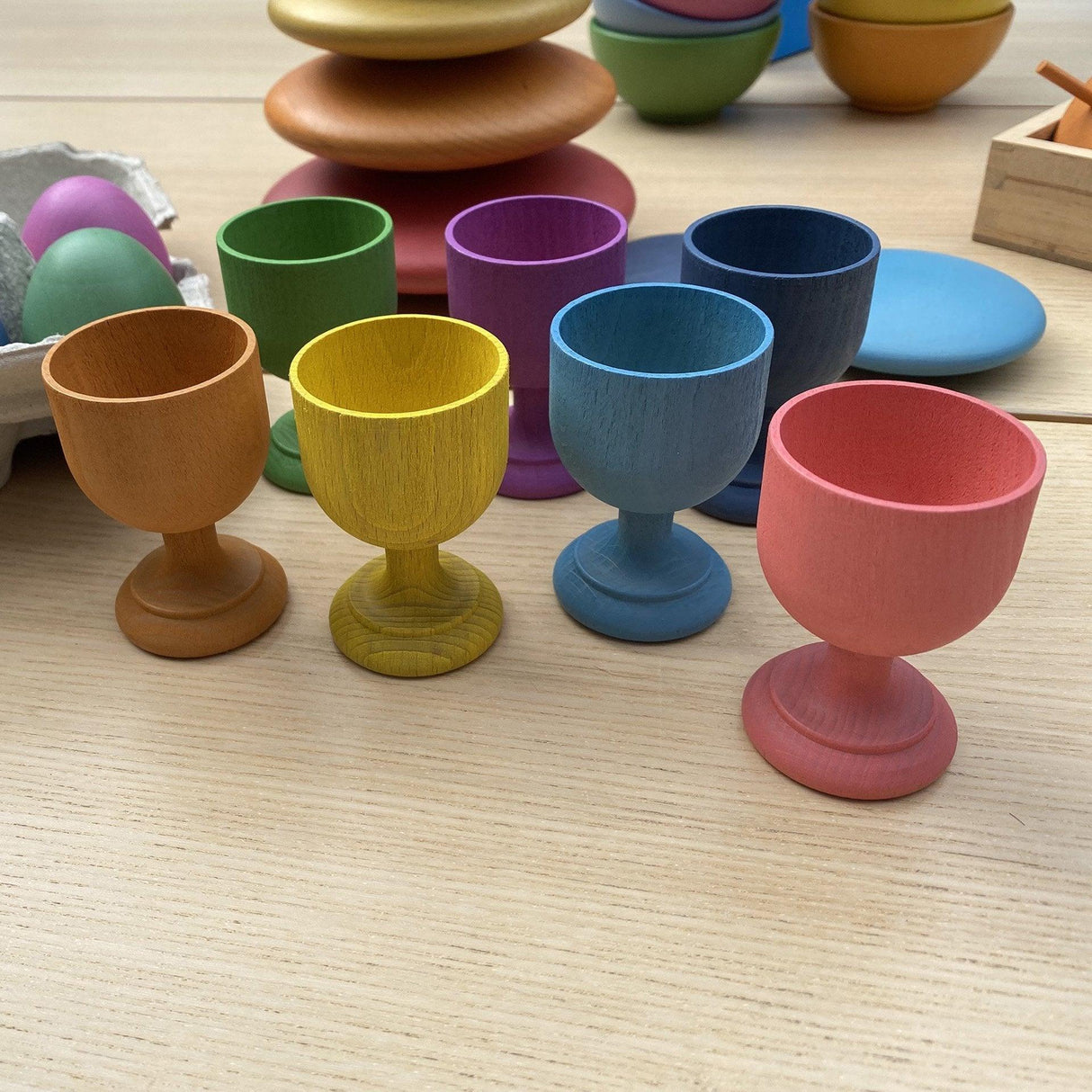 TickiT: podstawki do jajek Rainbow Wooden Egg Cups 7 el. - Noski Noski