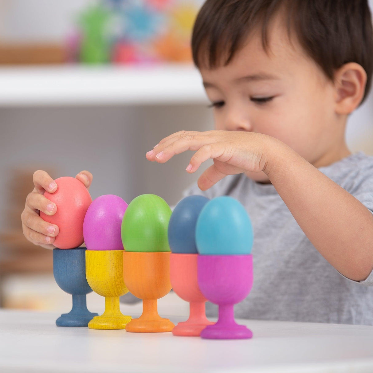 TickiT: podstawki do jajek Rainbow Wooden Egg Cups 7 el. - Noski Noski